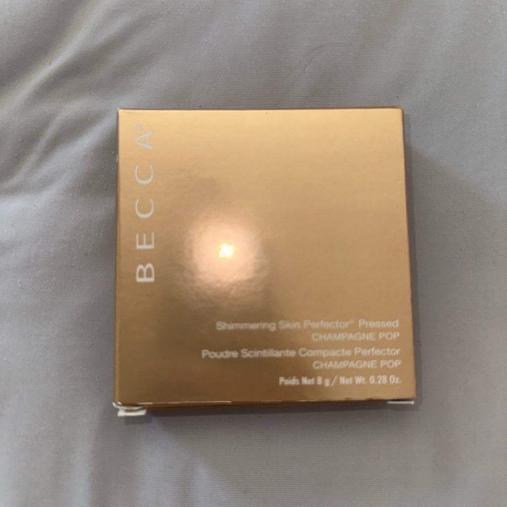 BECCA Shimmering Skin Perfector in Champagne Pop